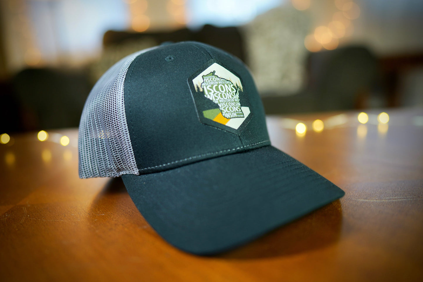 "Vintage Wisconsin" Design Trucker Hat (Charcoal Mesh/ Black Fabric)